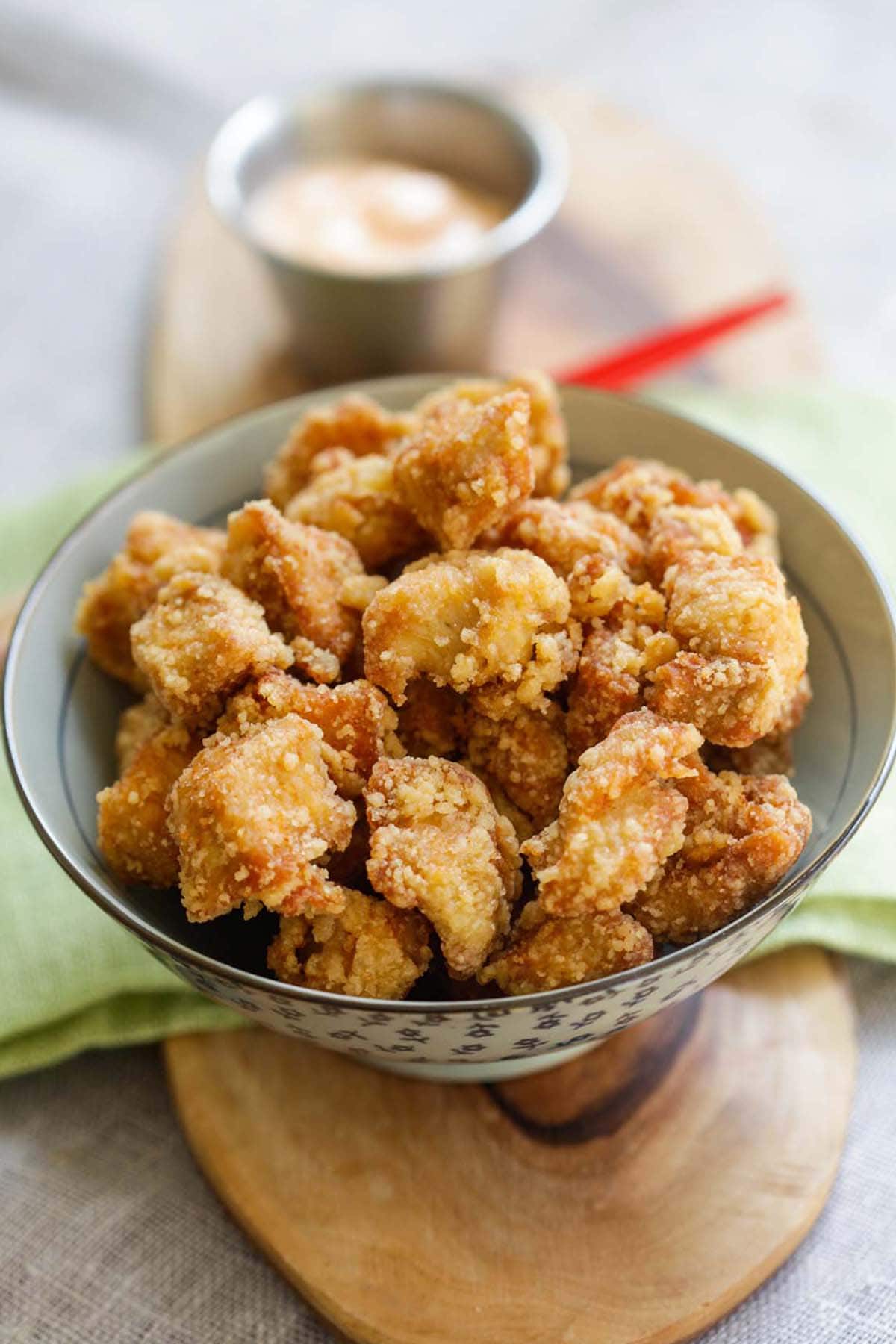 Chicken Karaage served in a bowl with mayo on the side.