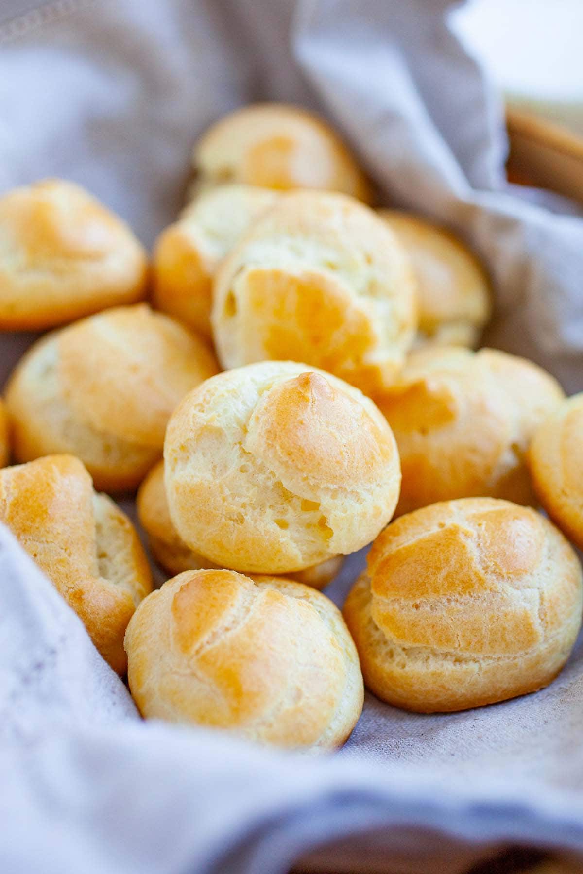 A close-up view of Choux Pastry, showcasing the delicate, golden-brown puff pastry shells.