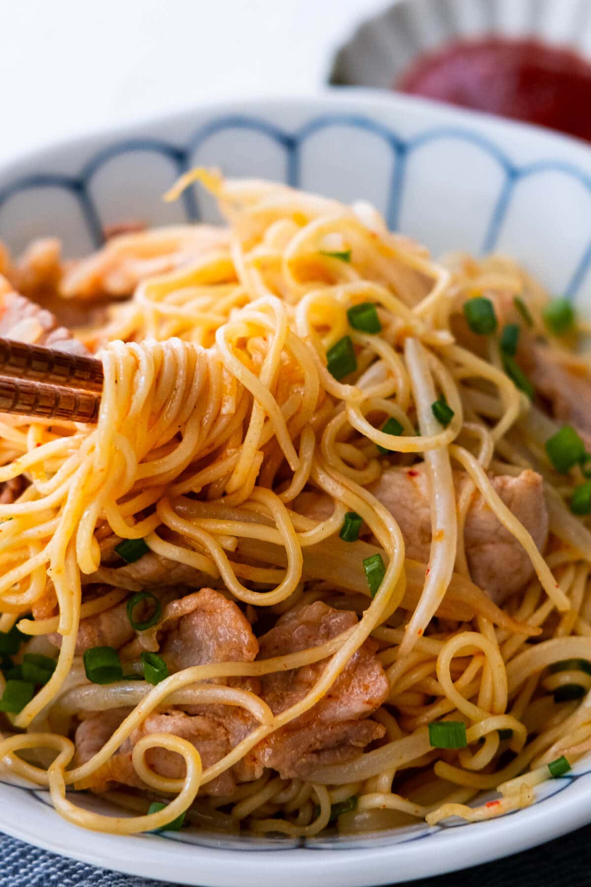 Easy and quick homemade sweet sour pork with noodles, ready to serve.