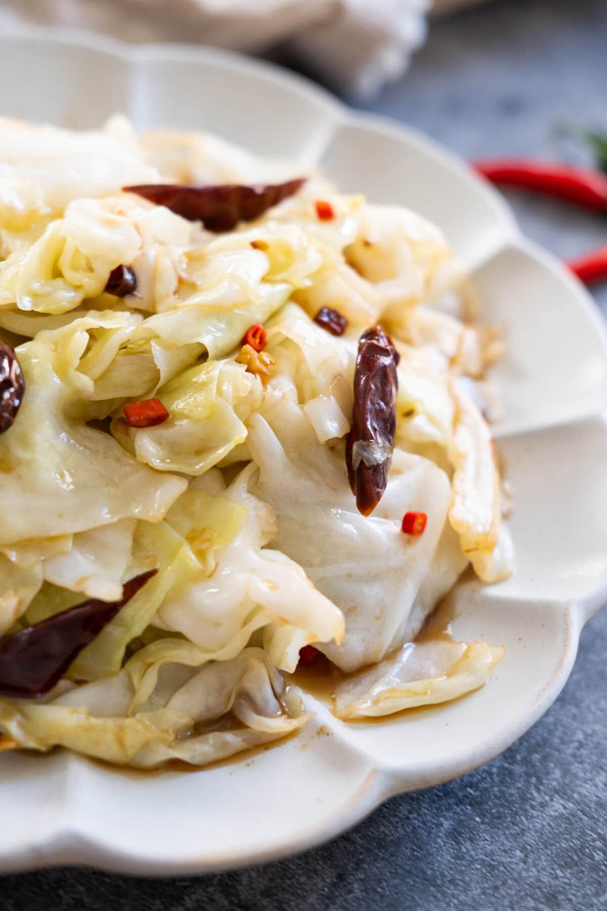 Sihuan Cabbage covered with dried chili served in a plate. 