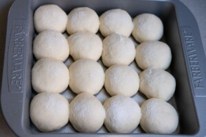 Sprinkle sugar and milk powder mixture on the milk buns before baking