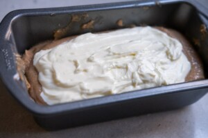 Fill the pan with cake batter and cream cheese filling