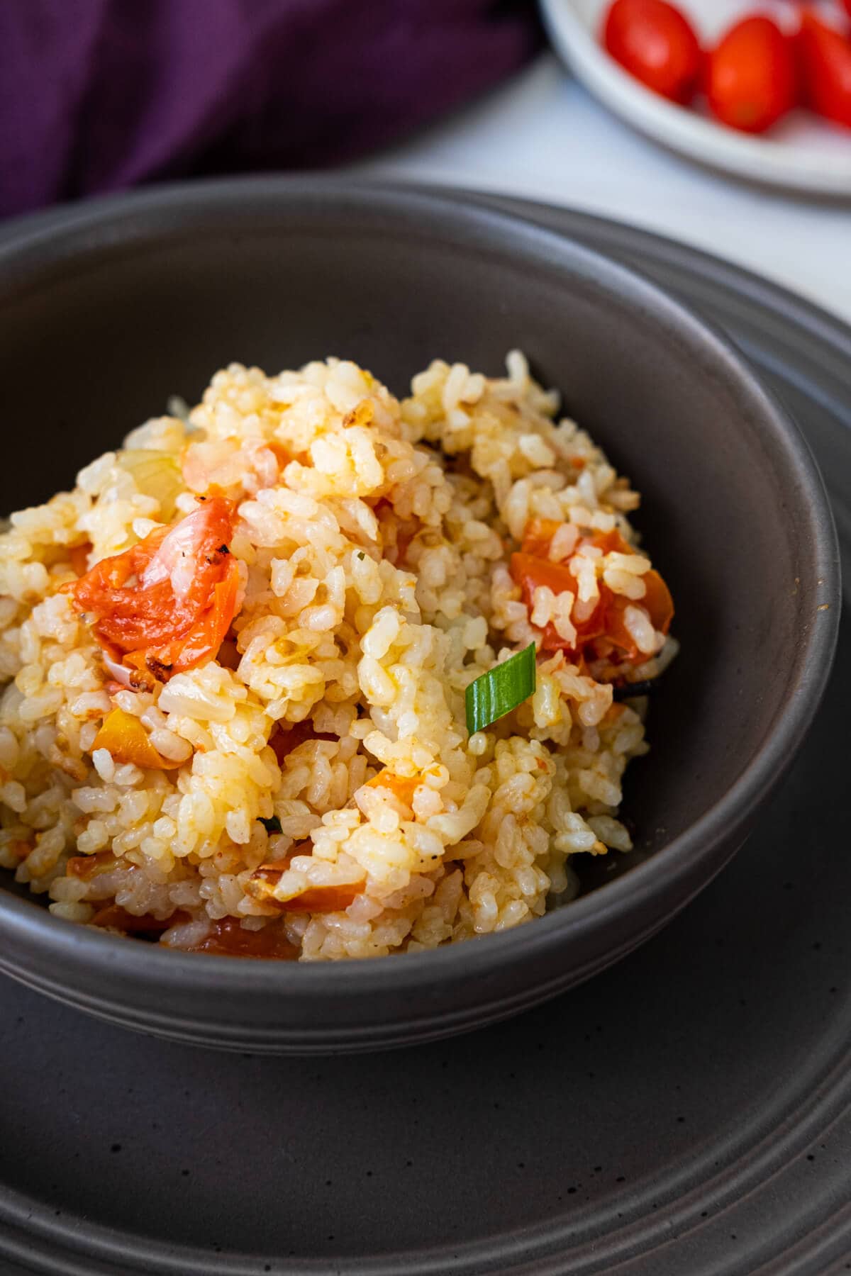 A close up shot of a bowl of delicious Spanish rice. 