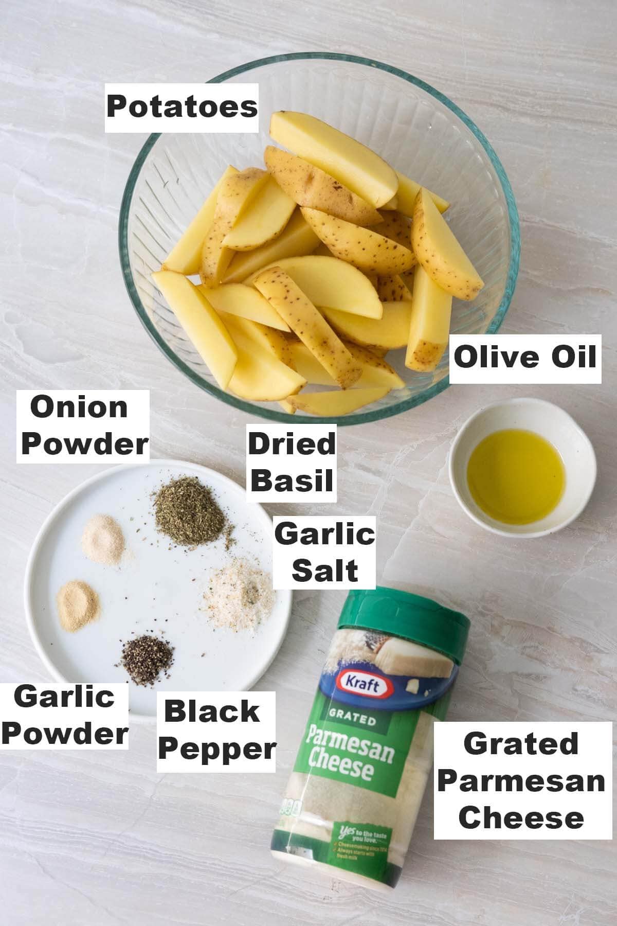 Ingredients for garlic parmesan potato wedges' recipe: potatoes, garlic power, onion powder, salt, olive oil, black pepper, dried basil and grated parmesan cheese.