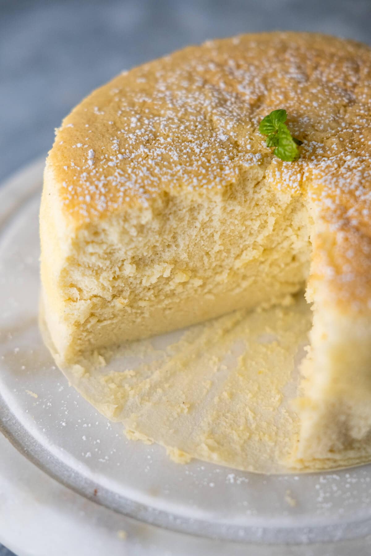 Close-up of a cross section of a cut yogurt cake. 