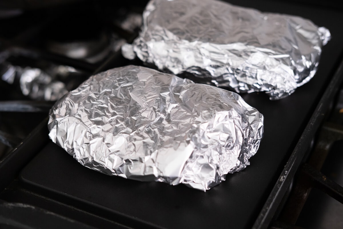 Ingredients wrapped in foil and roll up the edges to seal. 