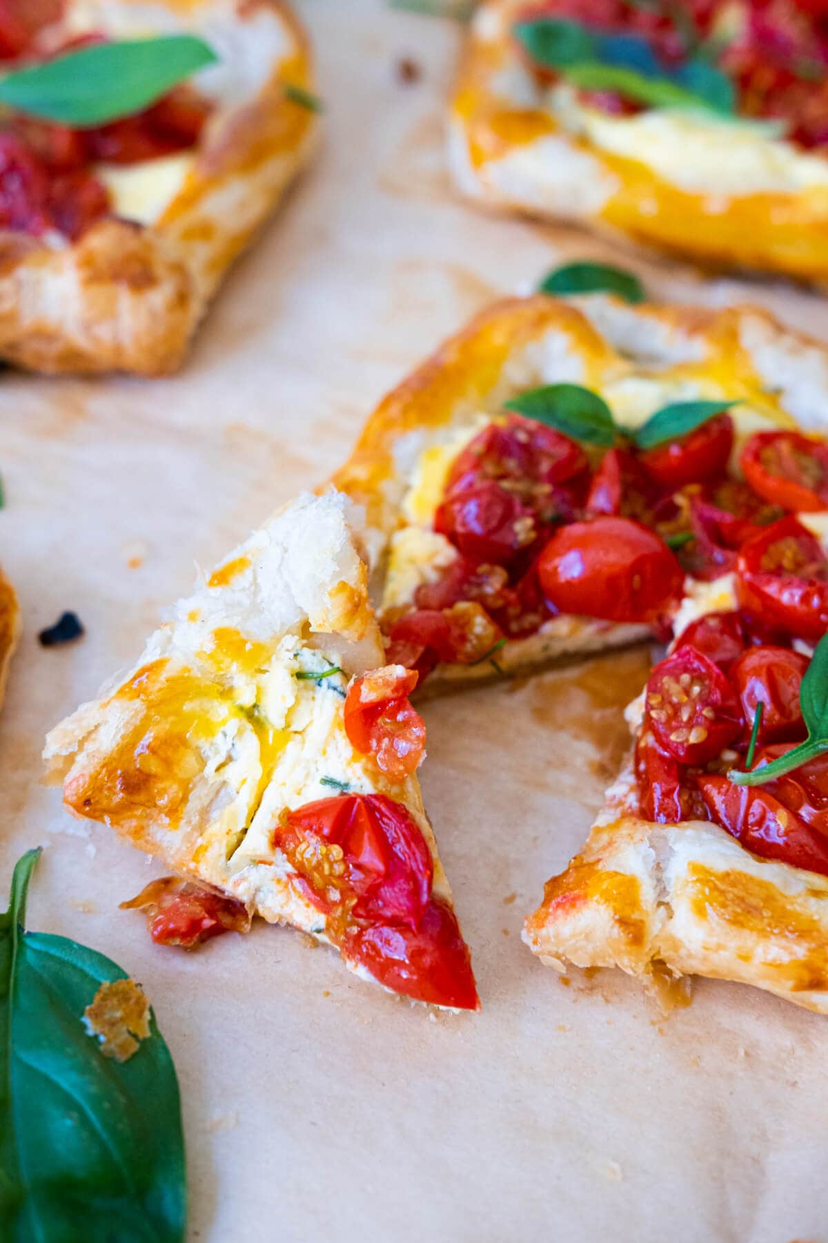 Flaky puff holds creamy cheese filling and juicy roasted tomatoes in the center. 