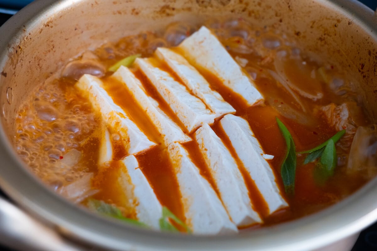 All ingredients boiling in a pot. 