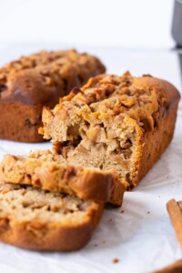 Two mini apple cinnamon bread sliced with apple fillings infused in the center.