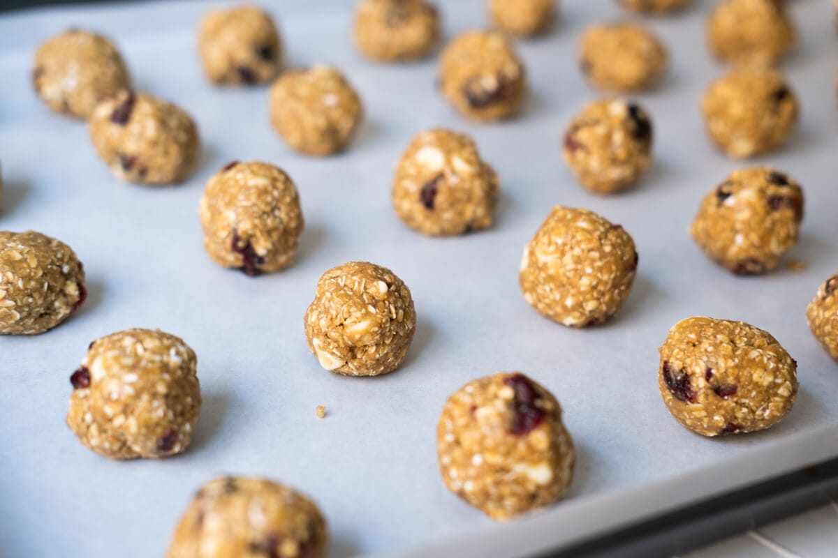 Cookie dough rolled into balls and arranged on the baking pan. 