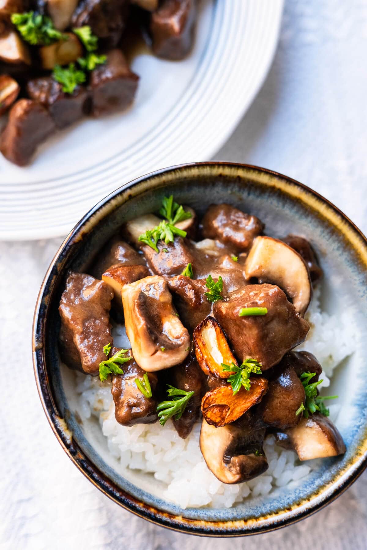 Homemade beef and mushroom stir-fry served over white rice.  