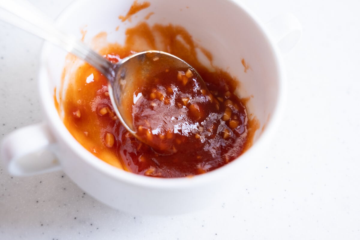 Dressing ingredients mixed in a small bowl. 