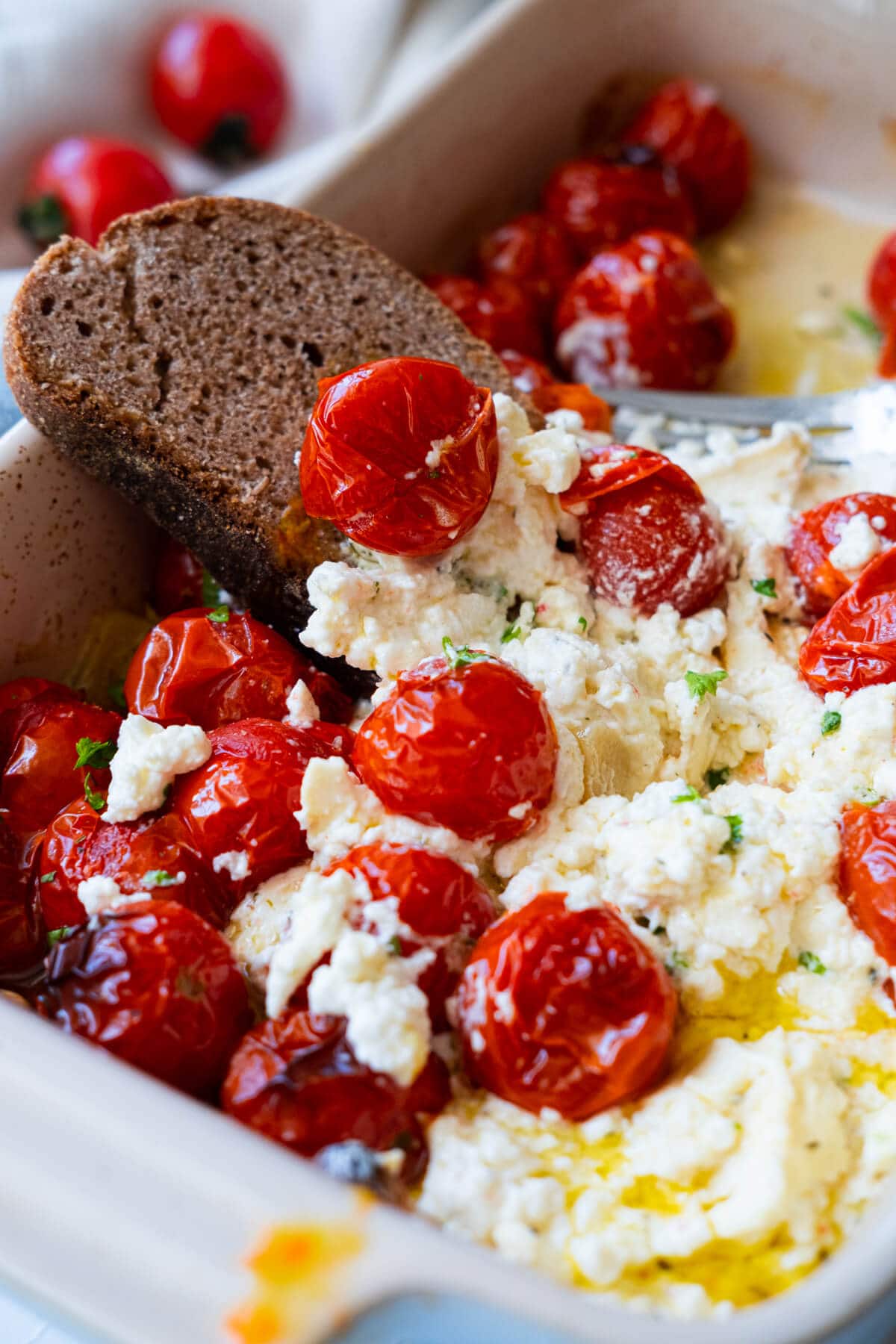 Bread dipped in the tomato and feta after it was baked. 