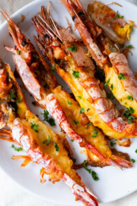 Grilled cheese prawns are perfectly baked with melted cheese.