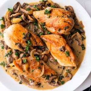 Chicken breasts coated in creamy mushroom sauce.