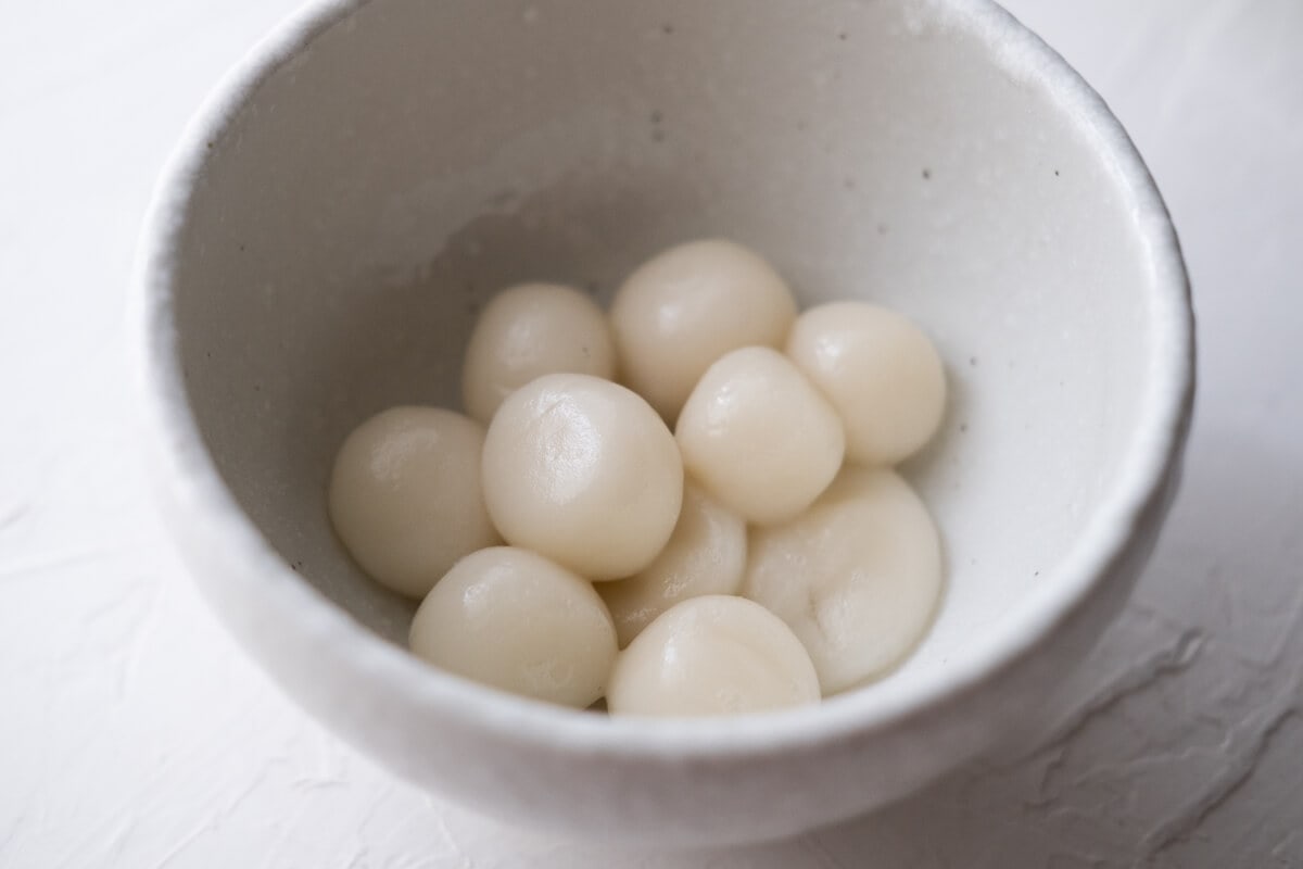 Cooked shiratama dango in a small bowl.  