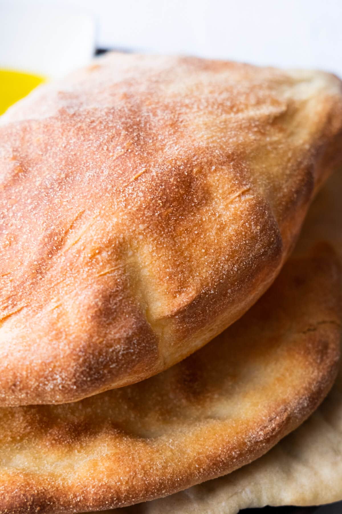 Close up on the crispy crust of puff bread. 