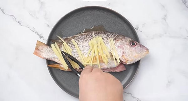 This image shows the fish ready to be steamed.