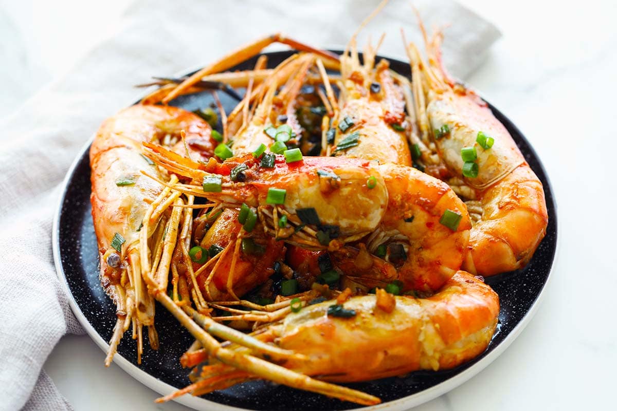 Pan fried fresh water prawn on a serving platter. 