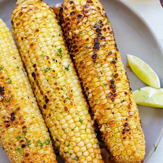 Charred grilled corn on a cob. 