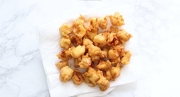 This image shows the fried chicken cubes on a paper towel.