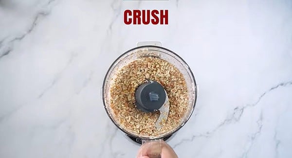 Crushed peanuts in a food processor.