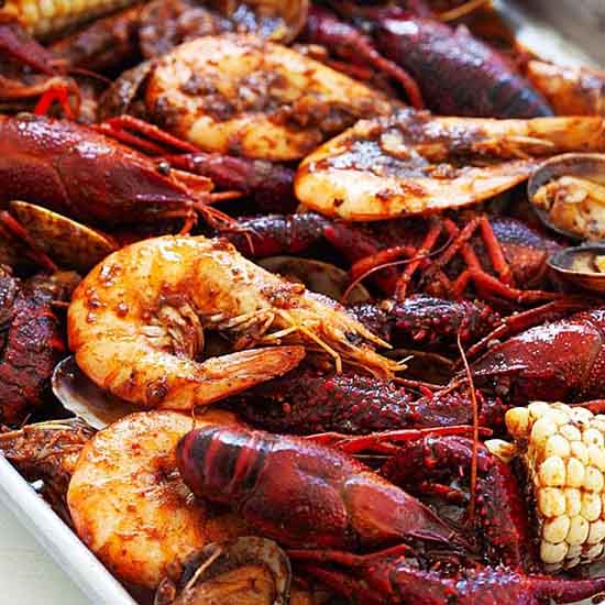 Delicious seafood boil with homemade Cajun seasoning and butter sauce. 