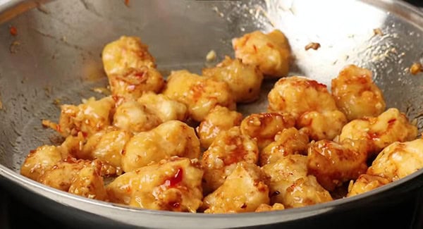 Deep fried chicken covered in Sweet Chili sauce. 