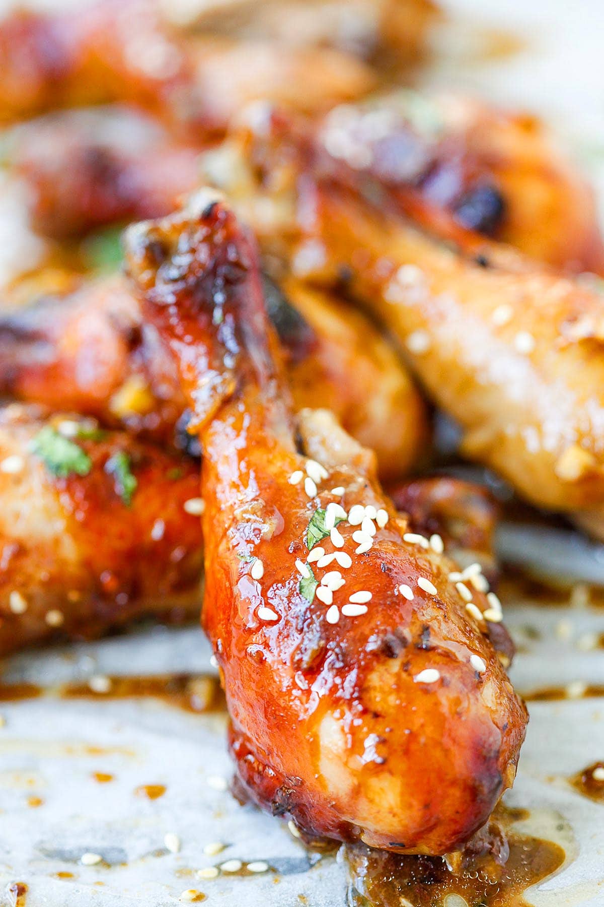 Moist and juicy Hoisin chicken drumsticks, ready to serve. 