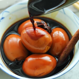 Delicious braised eggs in soy sauce in a bowl.