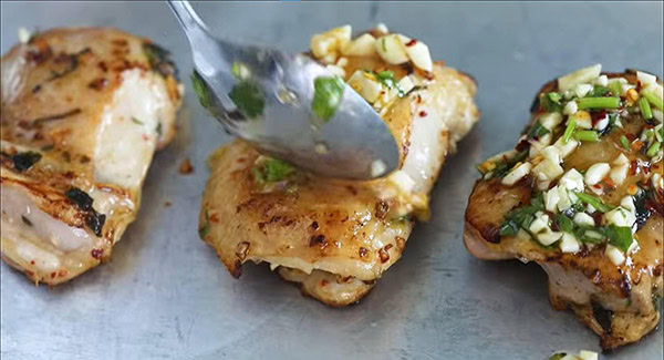 Marinate added on top of the chicken using a spoon. 