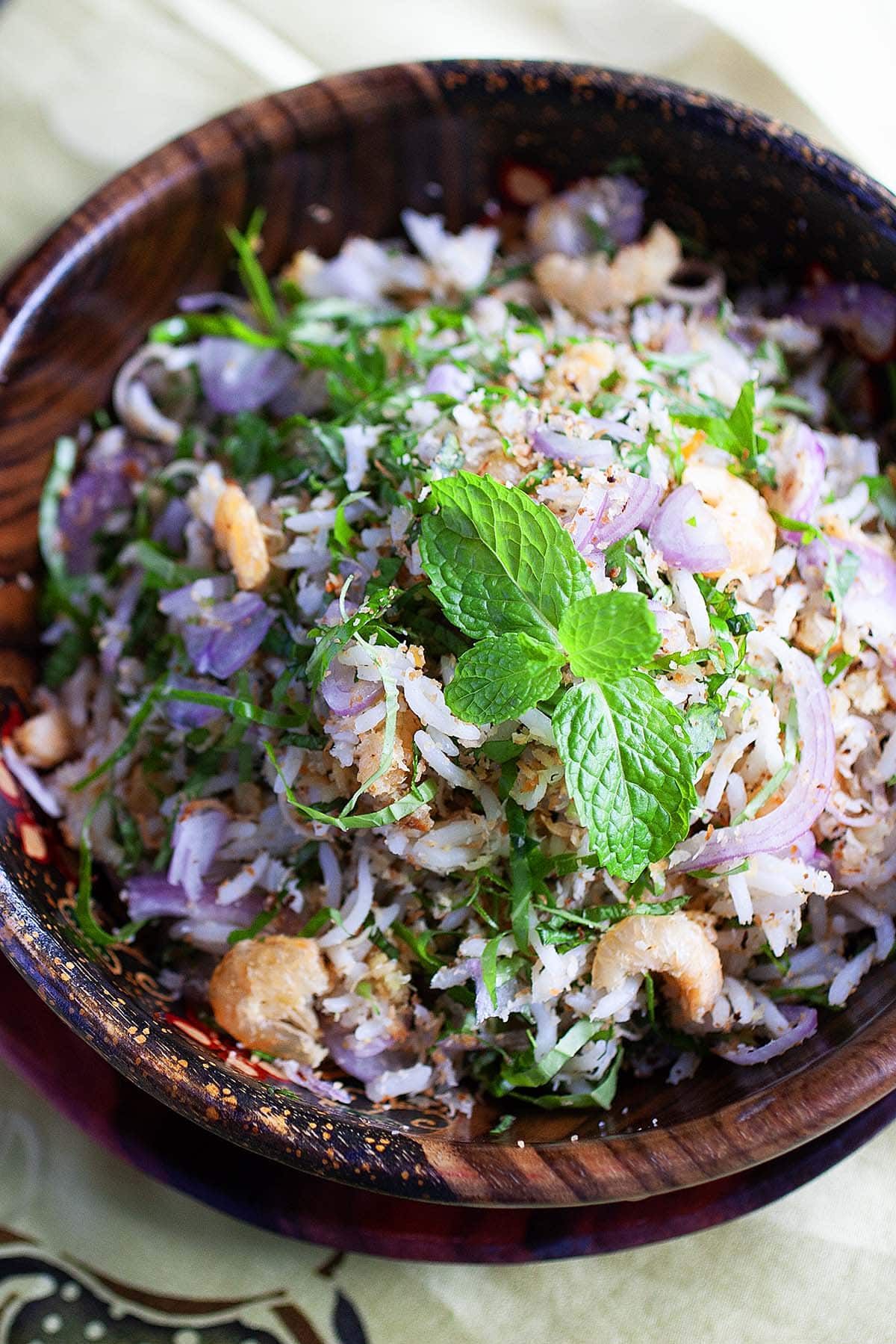 Herb rice nasi ulam, ready to serve in a bowl. 