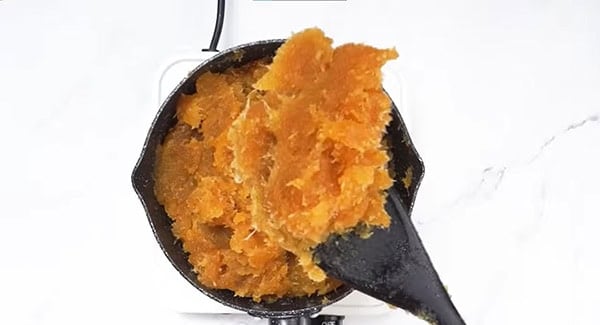 Pineapple jam on a spatula.