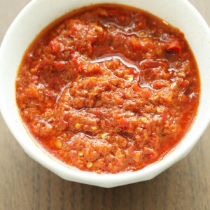 Red color Malaysian sambal or sambal tumis in a bowl.