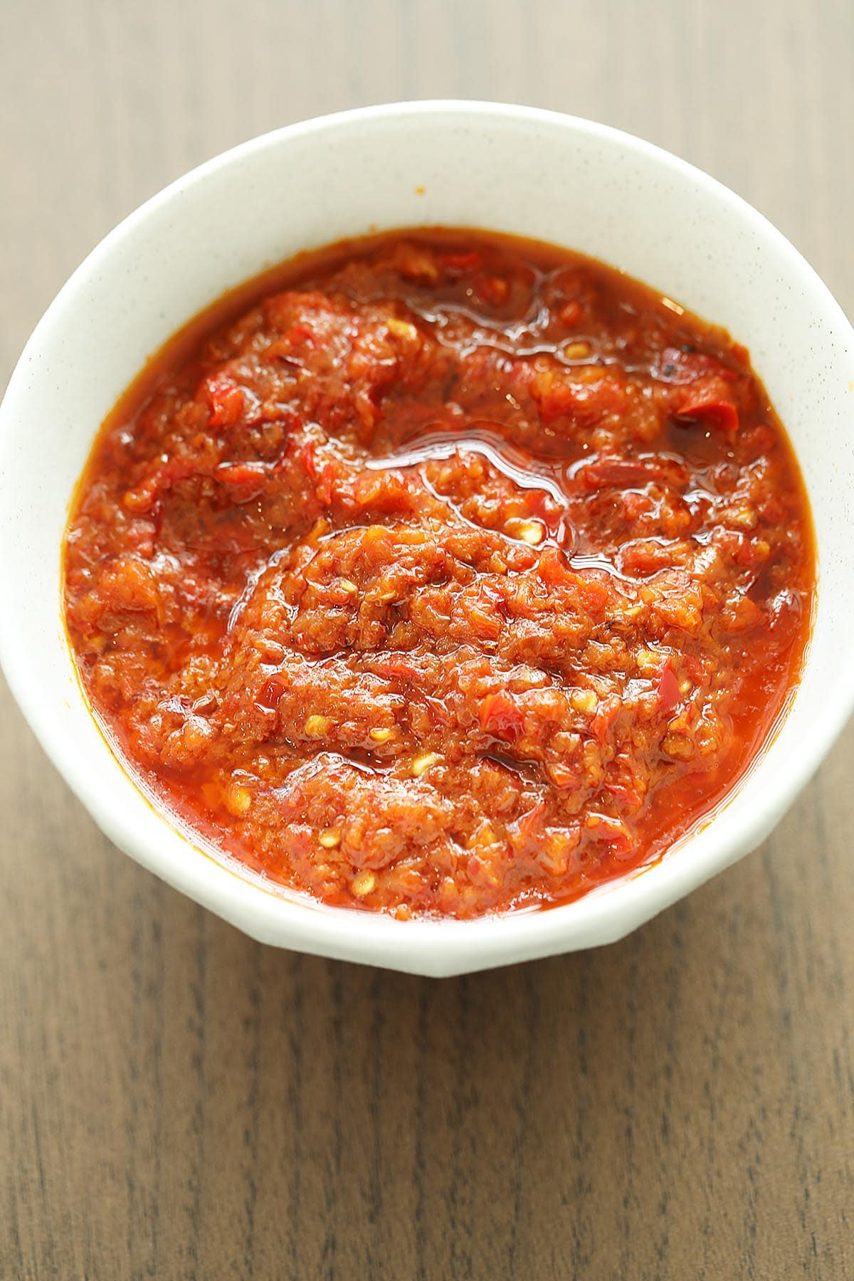 Red color Malaysian sambal or sambal tumis in a bowl. 