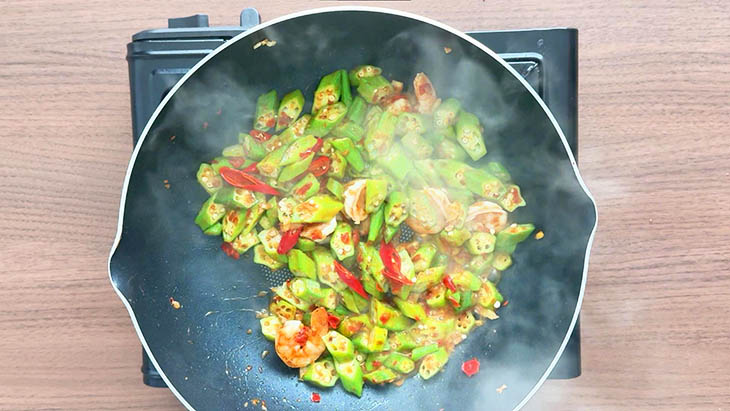 Sliced red chilies stir fried together with the sambal lady's finger.