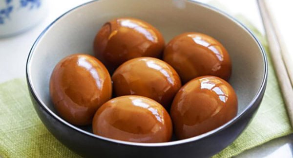 Delicious brown shoyu eggs served in a bowl. 