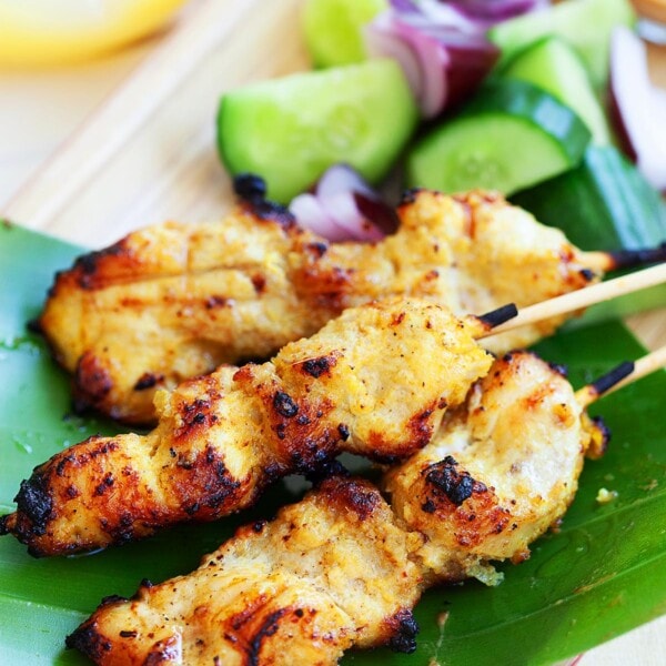 Thai chicken satay with peanut sauce, with cucumber salad.