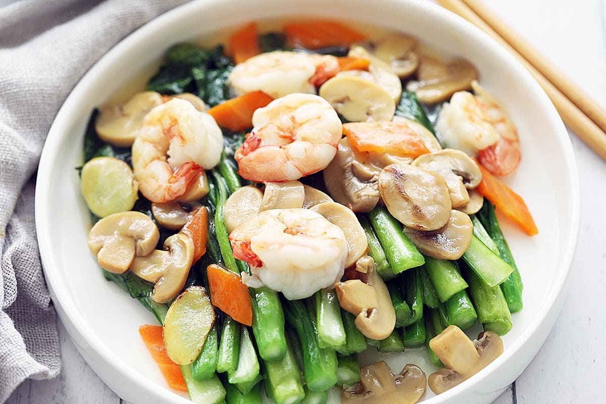 Choy sum stir fry served on a plate. 