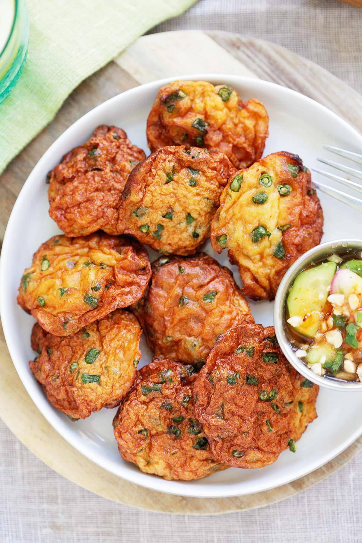 Authentic Thai fish cake served on a plate.