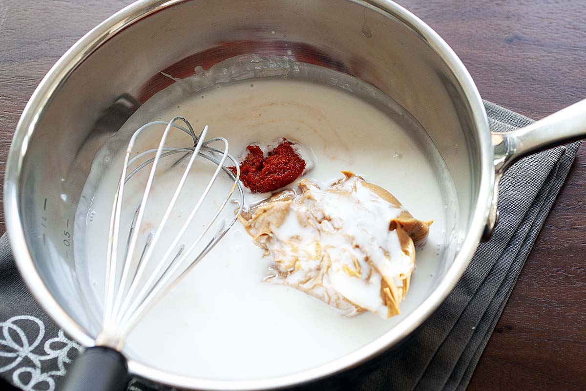 All ingredients for Asian Peanut Sauce in a saucepan.