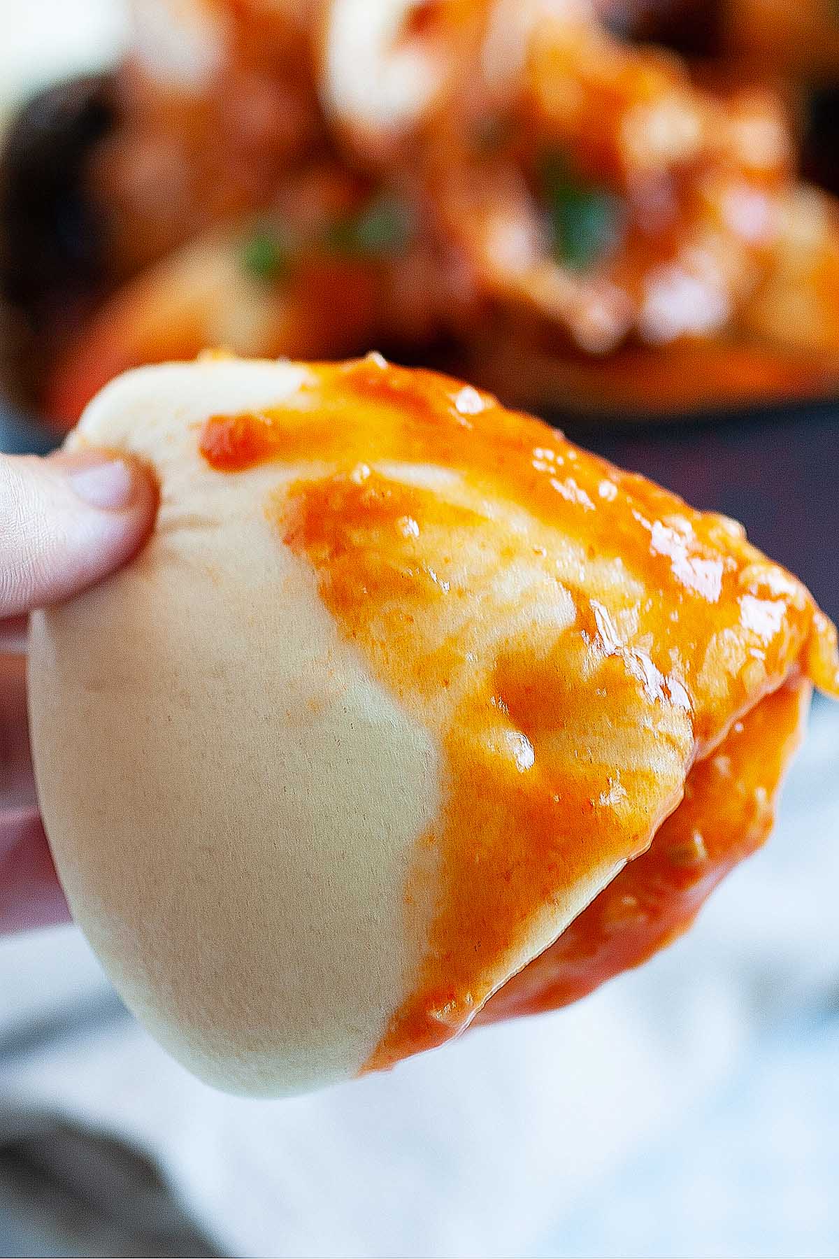 Steamed buns manton sopping up chili crab sauce. 