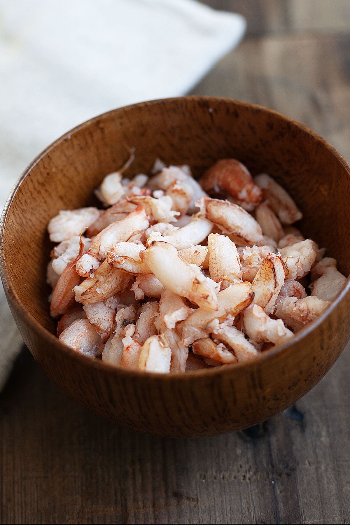 Crab meat in a wooden bowl. 