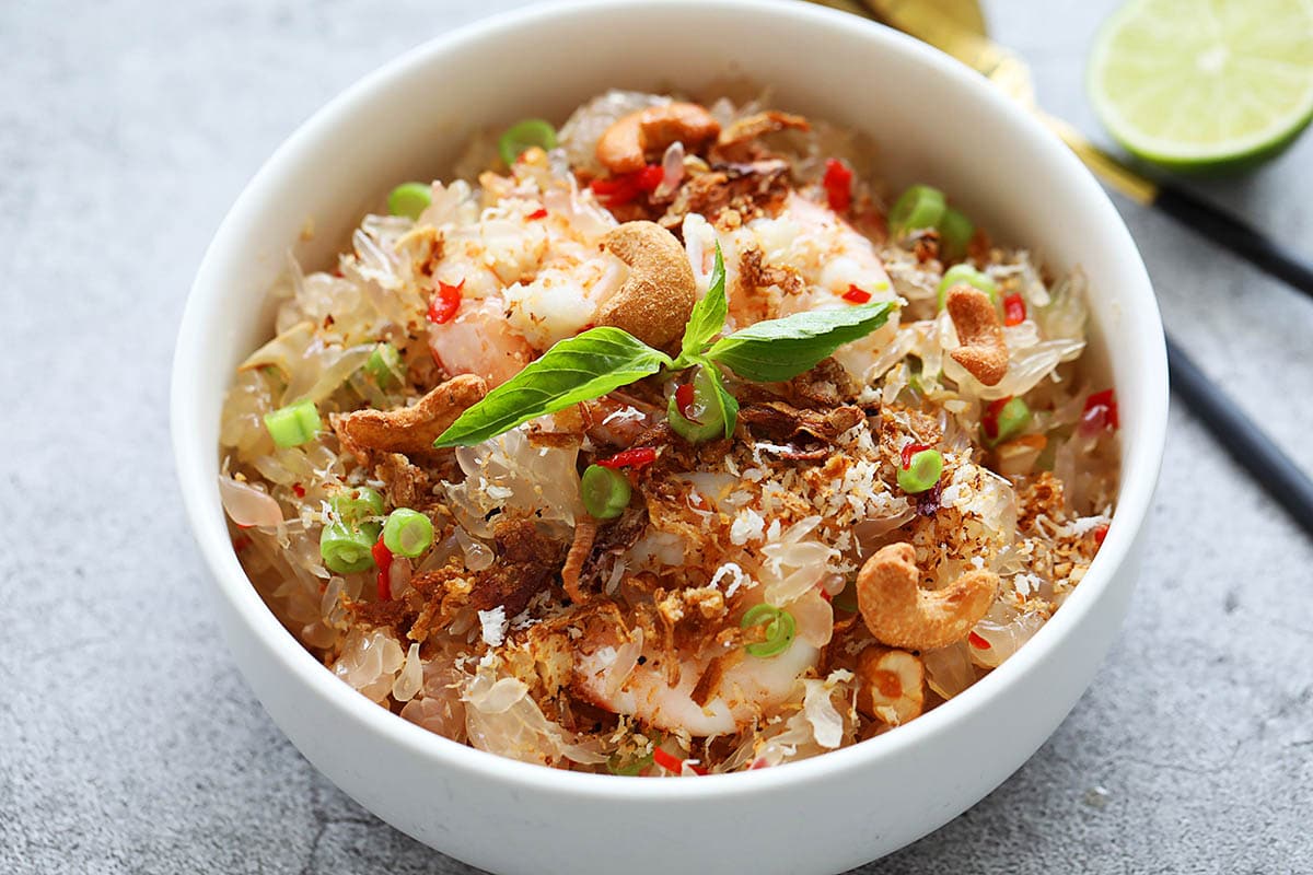 Authentic Thai pomelo salad with shrimp in a bowl. 