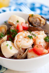 Seafood stew recipe with shrimp, scallops, mussels and clams.