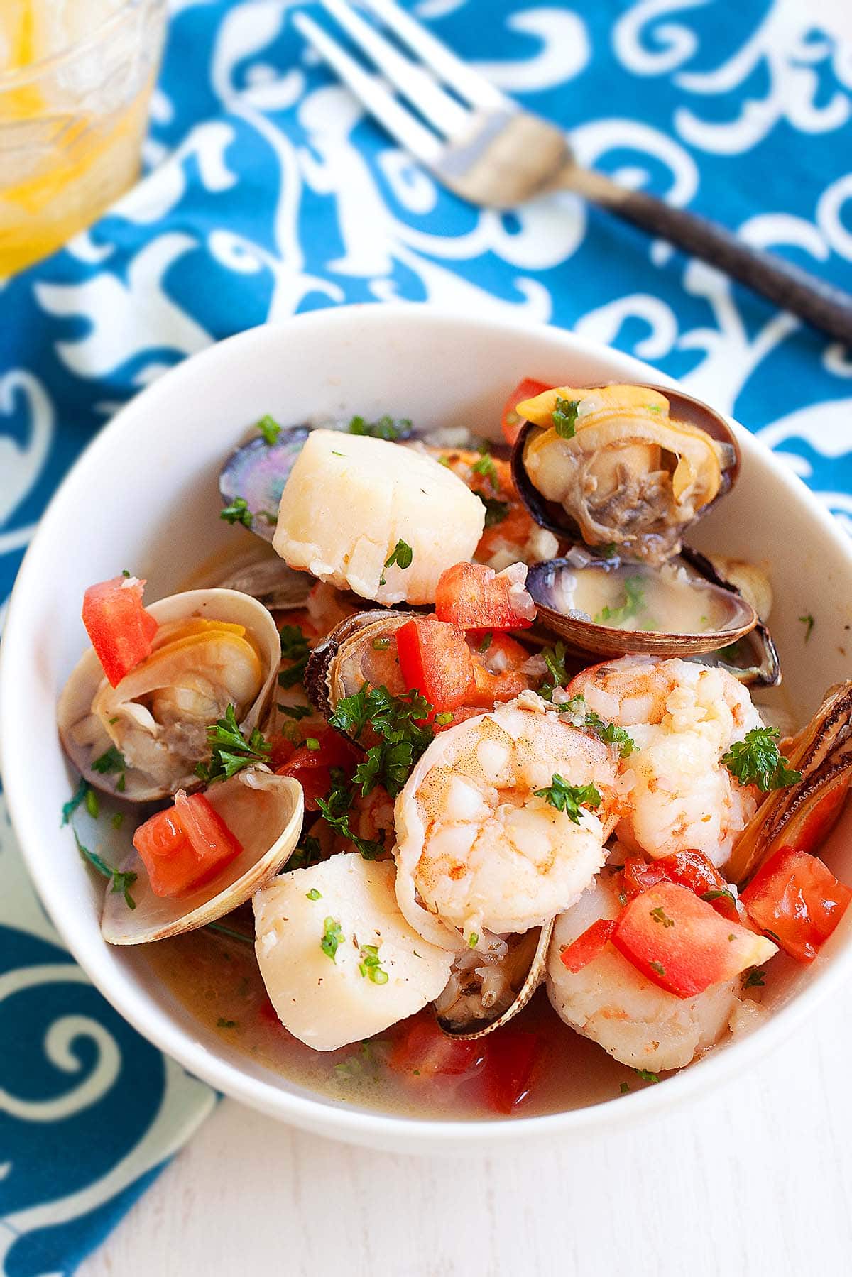 Seafood stew with shrimp, scallops, clams and mussels in Italian tomato and wine sauce.