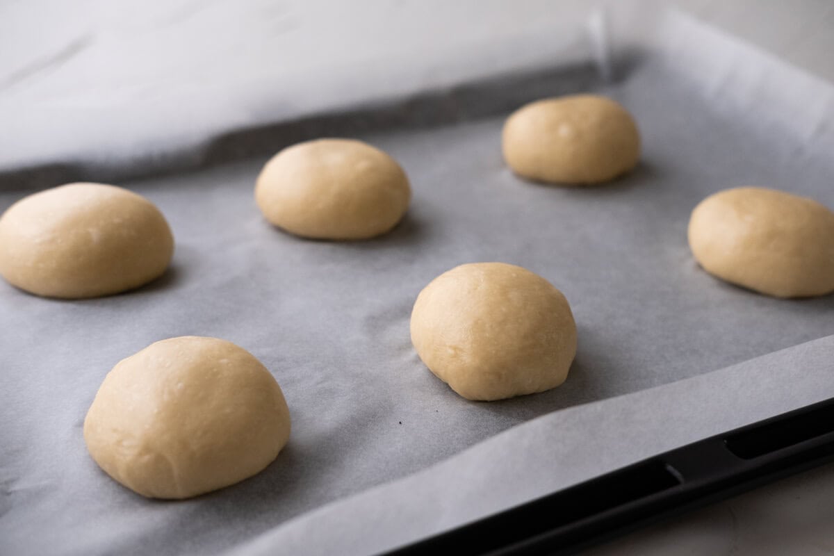 Place the bread dough on a baking sheet. 