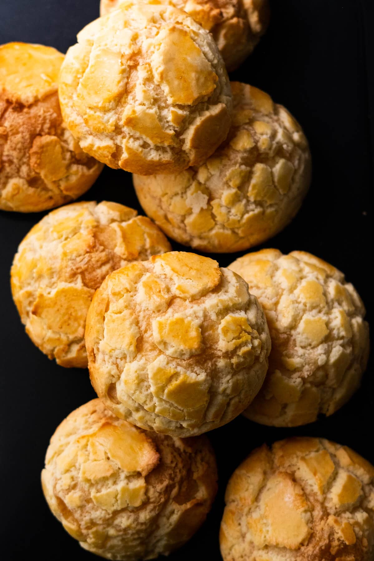 Baked polo buns with a golden, crisp crust and a textured, crumbly topping.