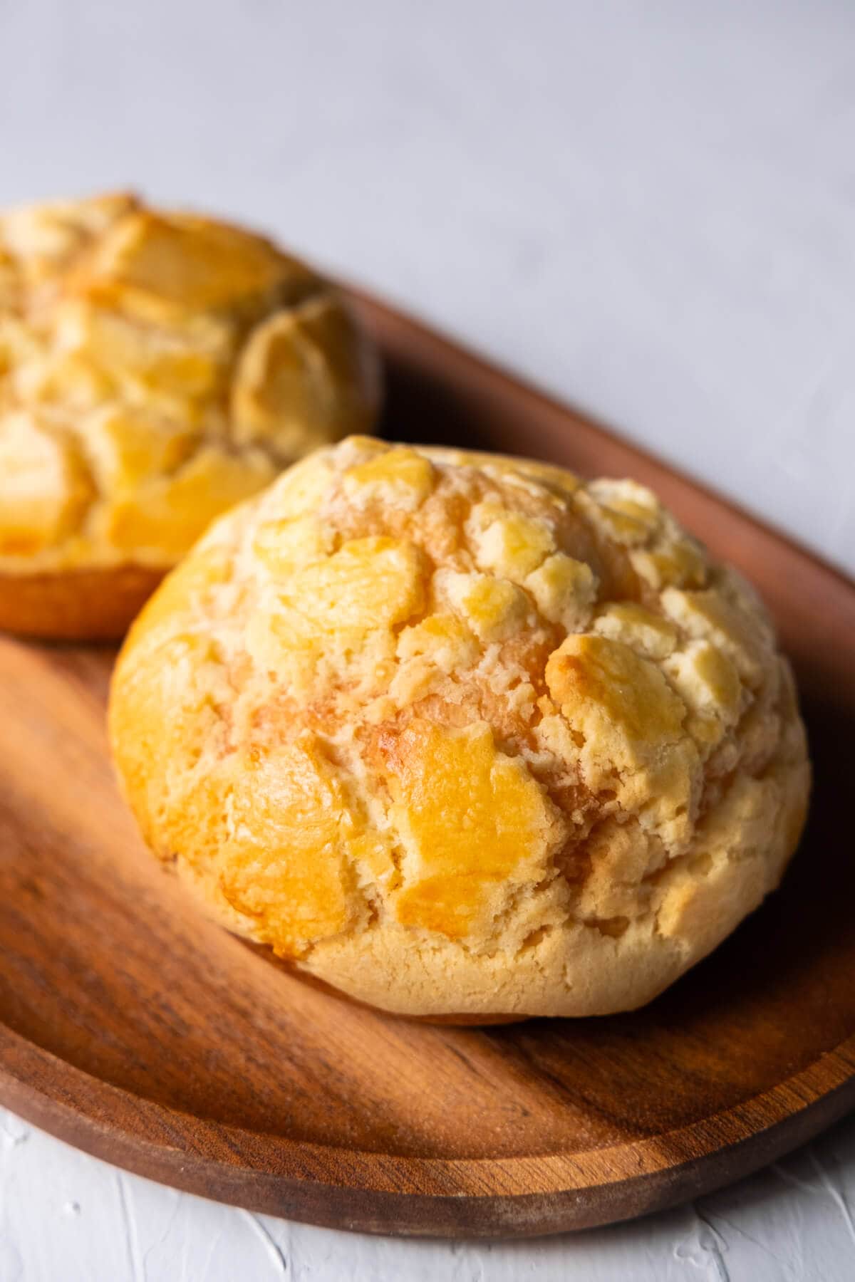 Hong Kong pineapple bun recipe served on plate.