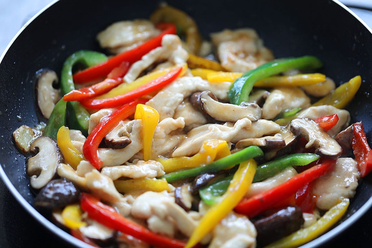 Chicken bell pepper in a wok.